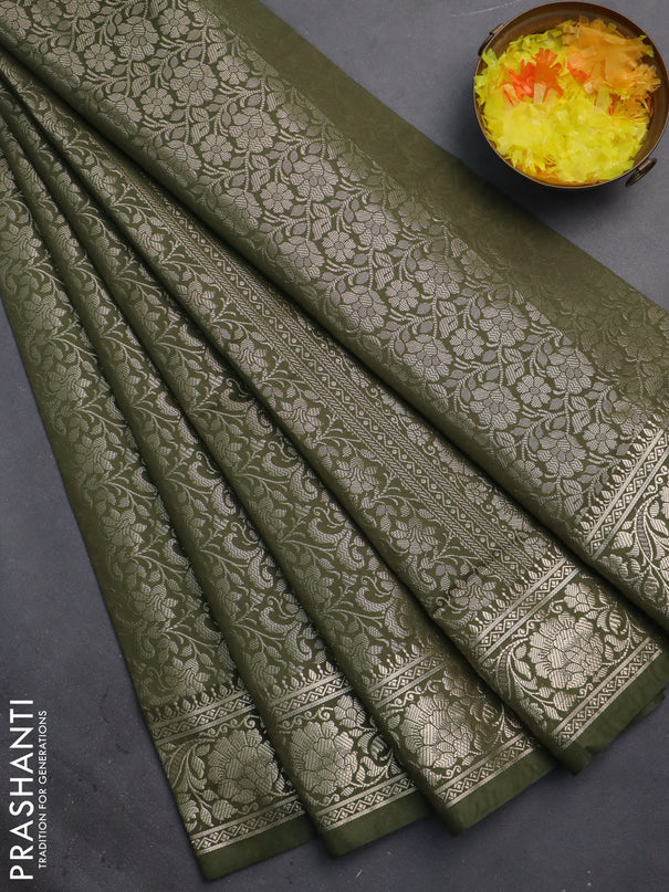 Semi soft silk saree sap green with allover zari woven brocade weaves -Without blouse