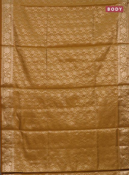 Semi soft silk saree mustrad yellow with allover zari woven brocade weaves -Without blouse