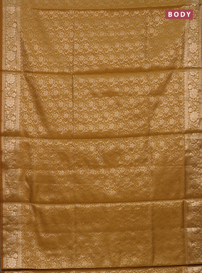 Semi soft silk saree mustrad yellow with allover zari woven brocade weaves -Without blouse