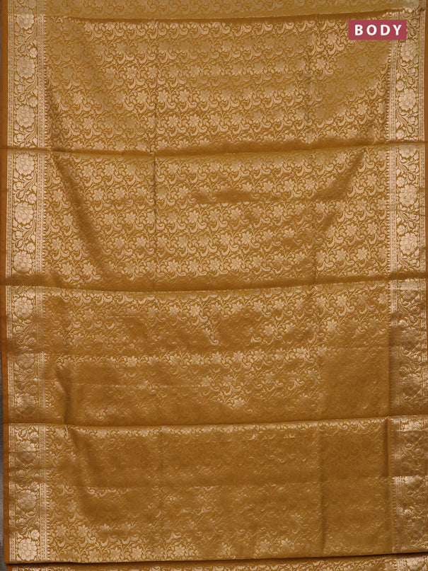 Semi soft silk saree mustrad yellow with allover zari woven brocade weaves -Without blouse