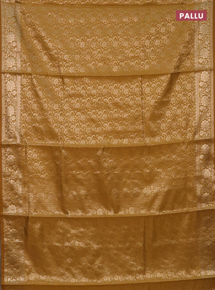 Semi soft silk saree mustrad yellow with allover zari woven brocade weaves -Without blouse