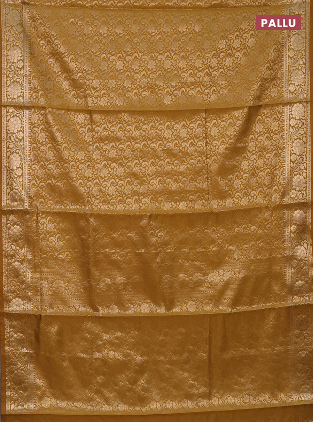 Semi soft silk saree mustrad yellow with allover zari woven brocade weaves -Without blouse