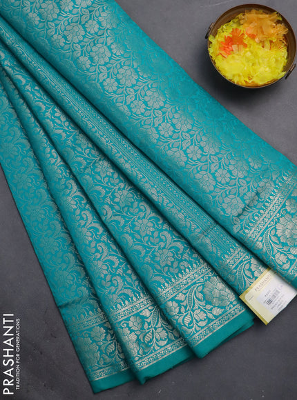 Semi soft silk saree teal blue with allover zari woven brocade weaves -Without blouse