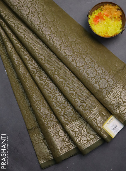 Semi soft silk saree sap green with allover zari woven brocade weaves -Without blouse