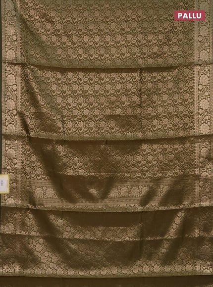 Semi soft silk saree sap green with allover zari woven brocade weaves -Without blouse