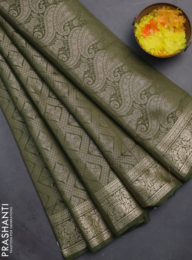 Semi soft silk saree sap green with allover zari woven brocade weaves -Without blouse