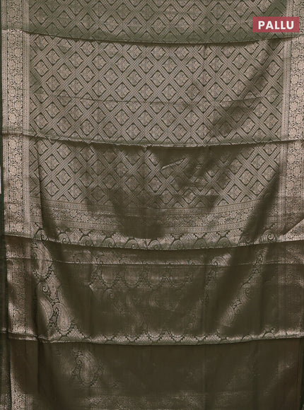 Semi soft silk saree sap green with allover zari woven brocade weaves -Without blouse