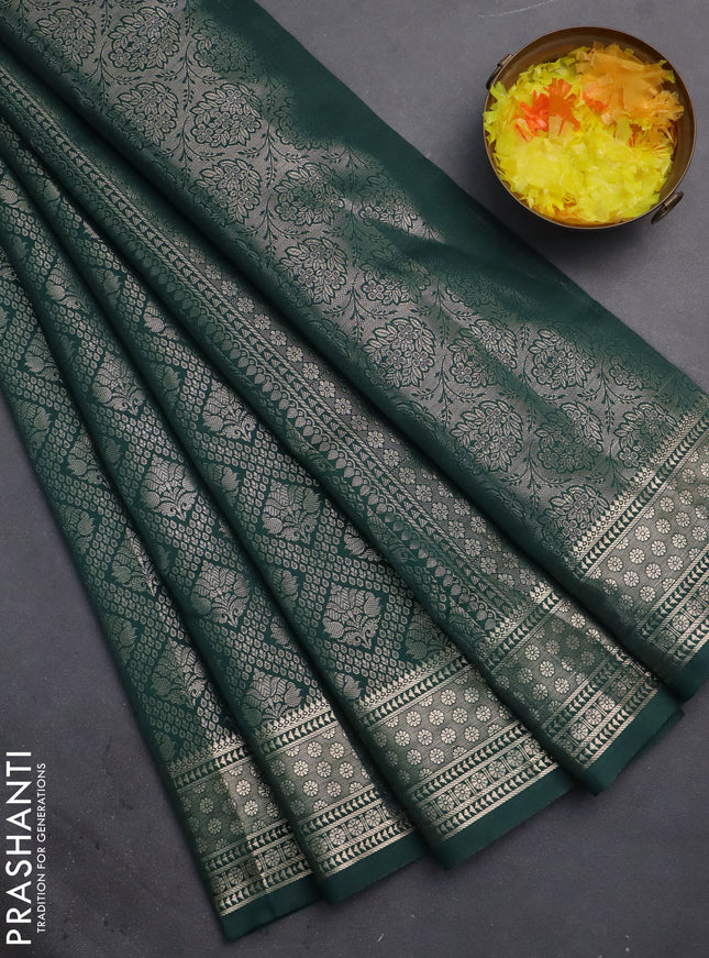 Semi soft silk saree bottle green with allover zari woven brocade weaves -Without blouse