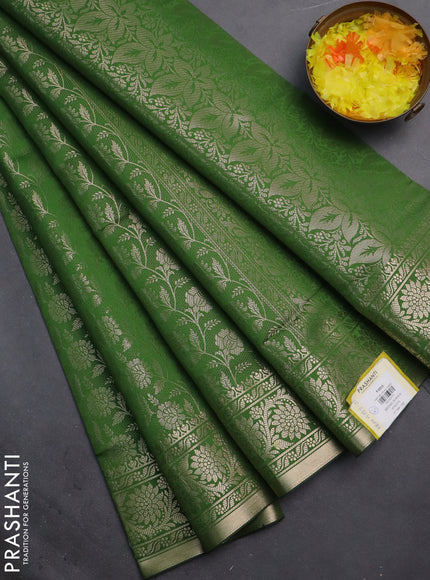 Semi soft silk saree green with allover zari woven brocade weaves -Without blouse