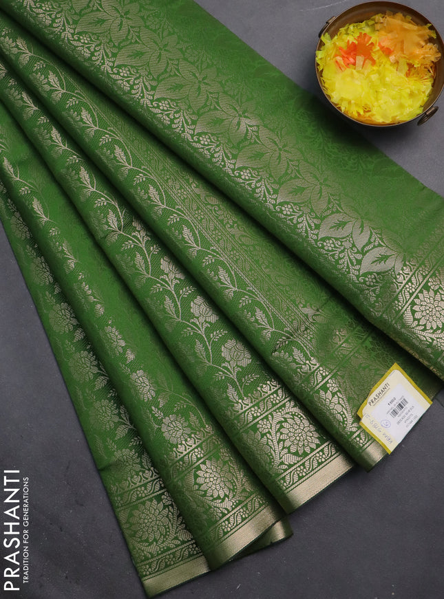 Semi soft silk saree green with allover zari woven brocade weaves -Without blouse