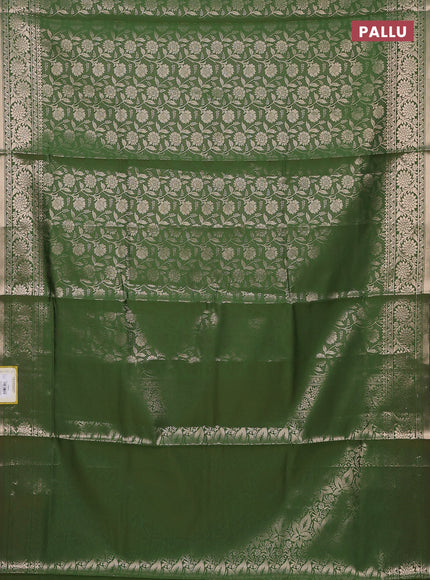 Semi soft silk saree green with allover zari woven brocade weaves -Without blouse