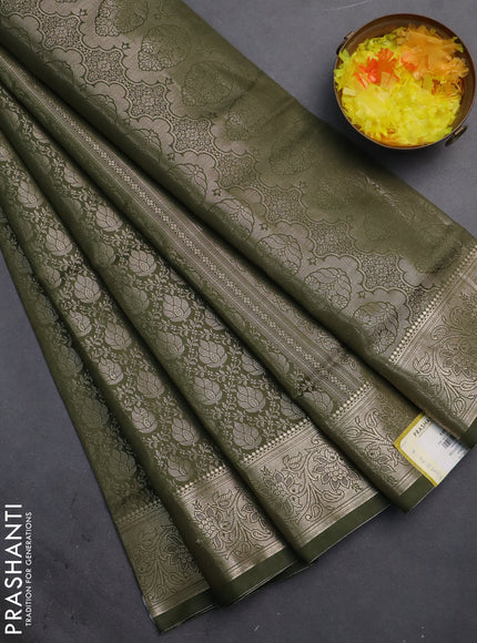 Semi soft silk saree sap green with allover zari woven brocade weaves -Without blouse