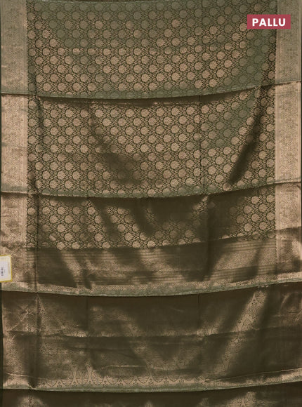Semi soft silk saree sap green with allover zari woven brocade weaves -Without blouse