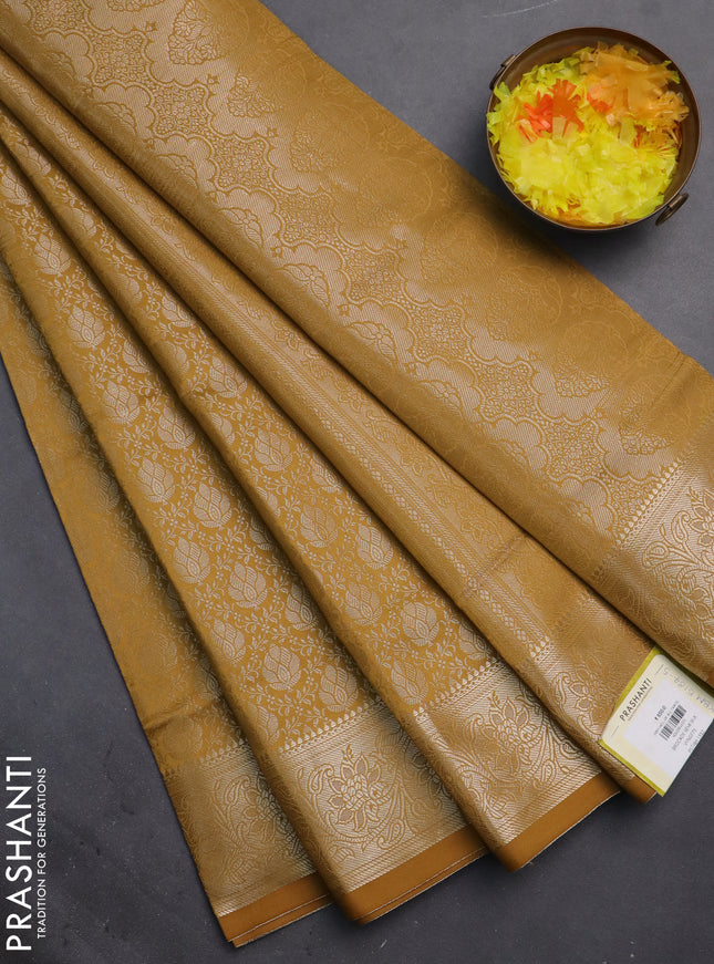 Semi soft silk saree mustard yellow with allover zari woven brocade weaves -Without blouse