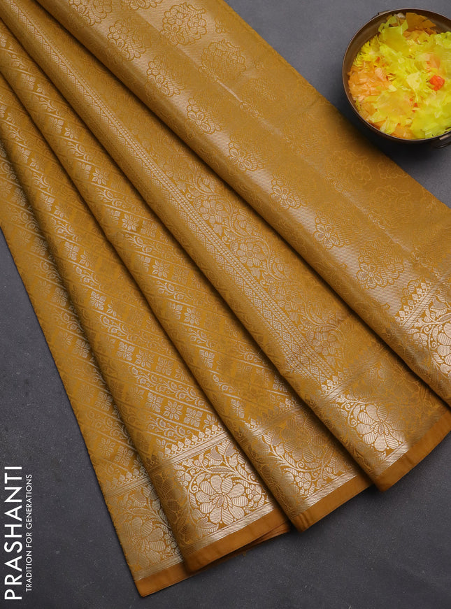 Semi soft silk saree mustard yellow with allover zari woven brocade weaves -Without blouse