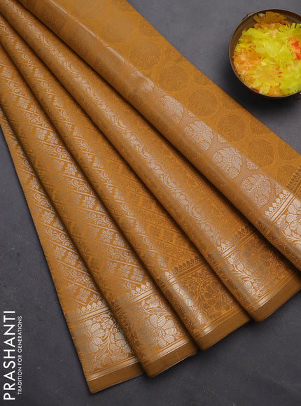 Semi soft silk saree mustard yellow with allover zari woven brocade weaves -Without blouse