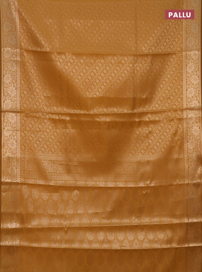 Semi soft silk saree mustard yellow with allover zari woven brocade weaves -Without blouse