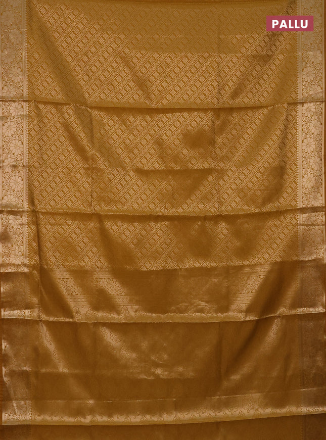 Semi soft silk saree mustard yellow with allover zari woven brocade weaves -Without blouse