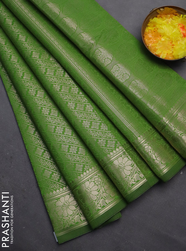 Semi soft silk saree green with allover zari woven brocade weaves -Without blouse