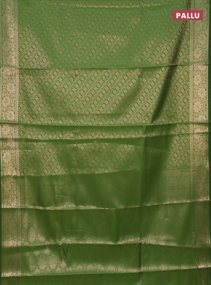 Semi soft silk saree green with allover zari woven brocade weaves -Without blouse