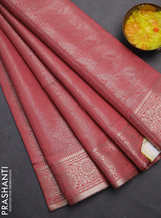 Semi soft silk saree peach shade with allover zari woven brocade weaves -Without blouse