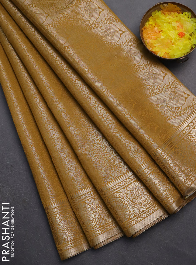 Semi soft silk saree mustard yellow with allover zari woven brocade weaves -Without blouse