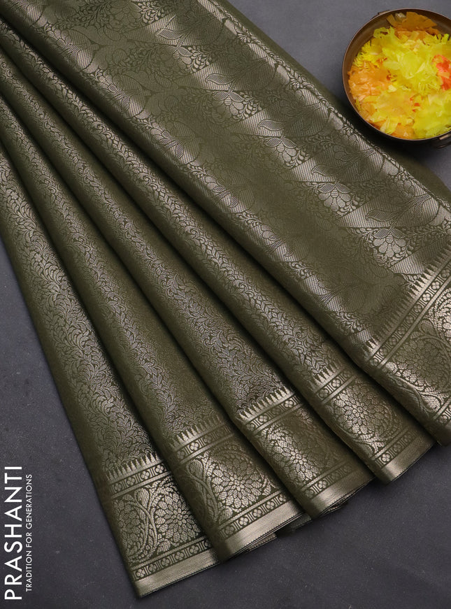 Semi soft silk saree sap green with allover zari woven brocade weaves -Without blouse