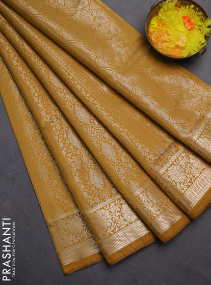 Semi soft silk saree mustard yellow with allover zari woven brocade weaves -Without blouse