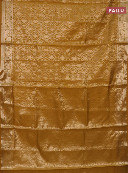 Semi soft silk saree mustard yellow with allover zari woven brocade weaves -Without blouse