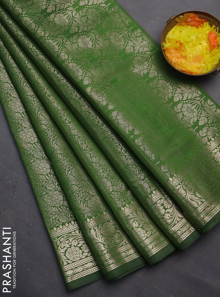 Semi soft silk saree green with allover zari woven brocade weaves -Without blouse