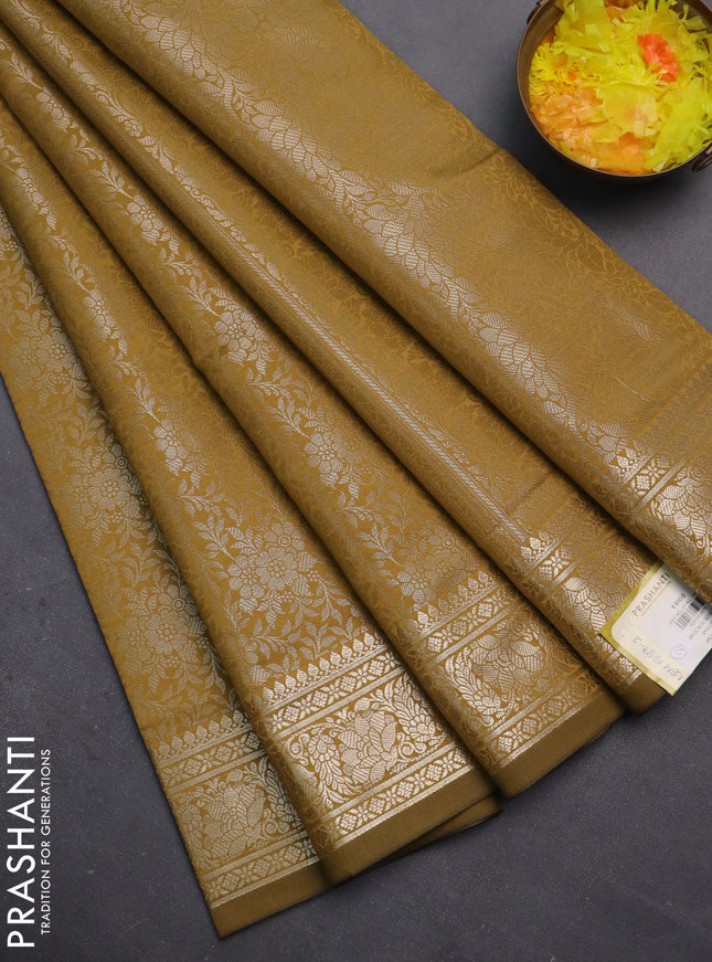 Semi soft silk saree mustard yellow with allover zari woven brocade weaves -Without blouse