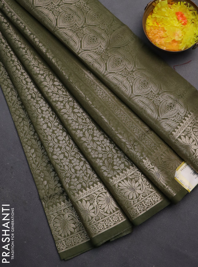 Semi soft silk saree sap green with allover zari woven brocade weaves -Without blouse
