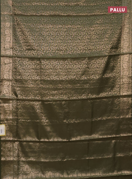 Semi soft silk saree sap green with allover zari woven brocade weaves -Without blouse