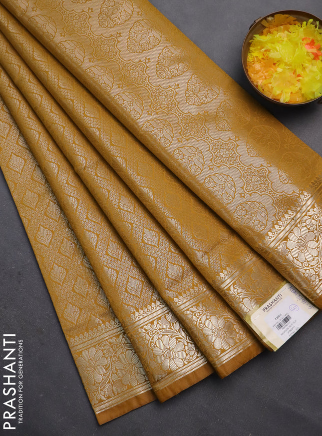 Semi soft silk saree mustard yellow with allover zari woven brocade weaves -Without blouse