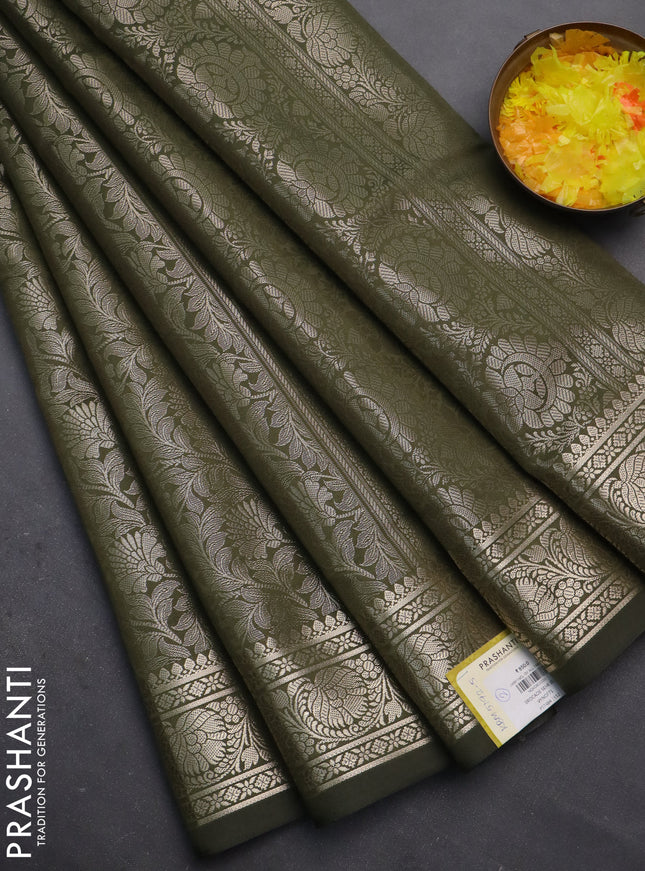 Semi soft silk saree sap green with allover zari woven brocade weaves -Without blouse