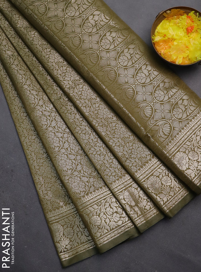 Semi soft silk saree sap green with allover zari woven brocade weaves -Without blouse