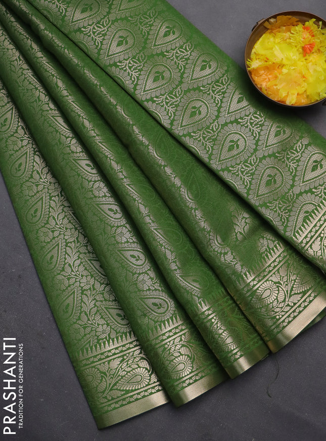 Semi soft silk saree green with allover zari woven brocade weaves -Without blouse