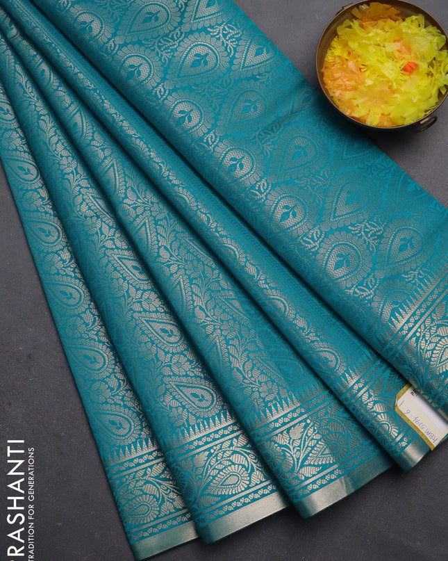 Semi soft silk saree teal blue with allover zari woven brocade weaves -Without blouse