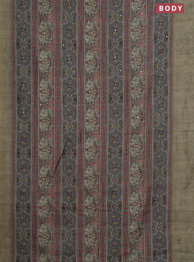 Semi linen saree pista green with allover madhubani prints & mirror work