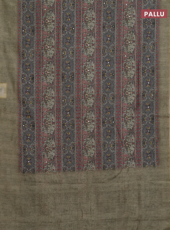 Semi linen saree pista green with allover madhubani prints & mirror work