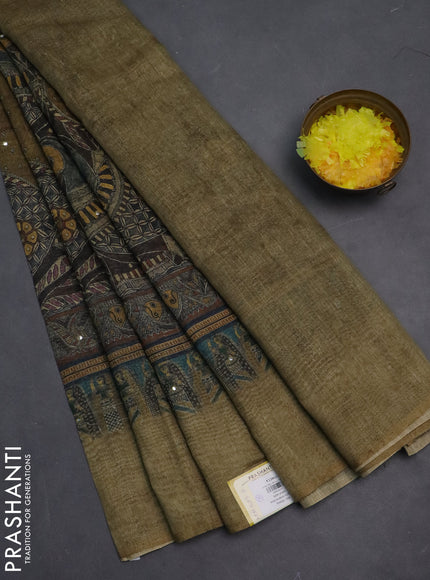 Semi linen saree sap green shade with allover madhubani prints & mirror work