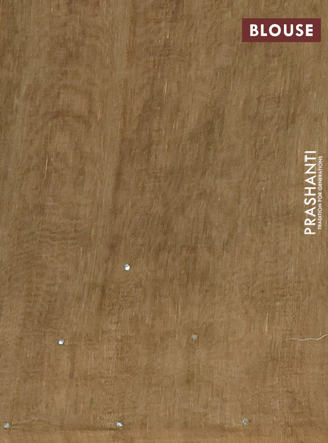 Semi linen saree sap green shade with allover madhubani prints & mirror work