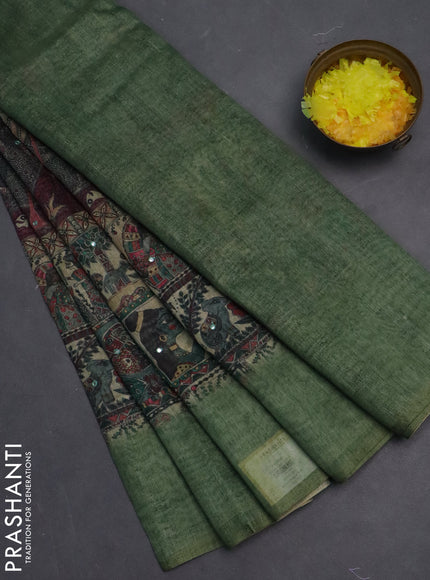 Semi linen saree green shade with allover madhubani prints & mirror work