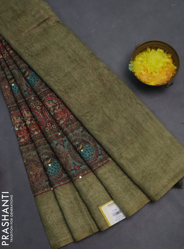 Semi linen saree pista green with allover madhubani prints & mirror work