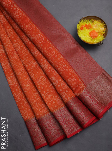 Chanderi silk cotton saree orange and red with allover prints and banarasi style border