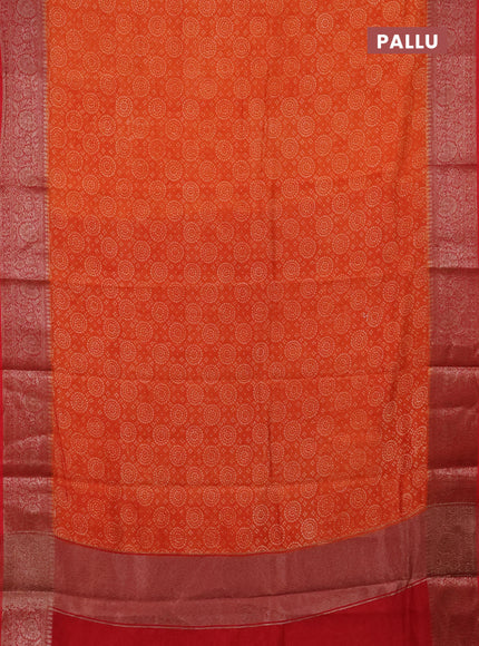 Chanderi silk cotton saree orange and red with allover prints and banarasi style border