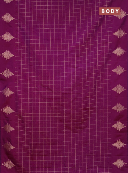 Semi soft silk saree purple with allover zari woven checked pattern and zari woven butta border