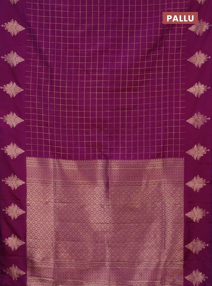 Semi soft silk saree purple with allover zari woven checked pattern and zari woven butta border