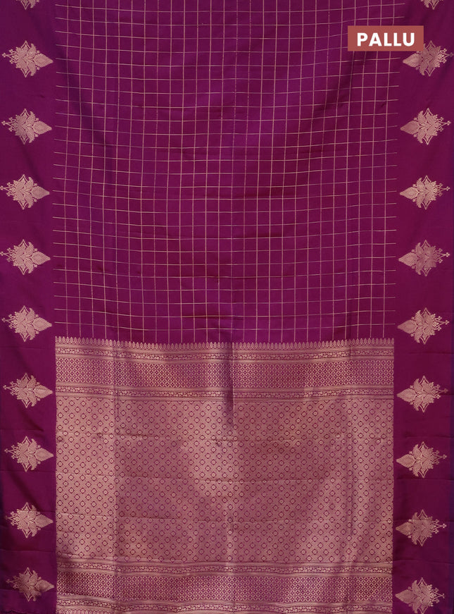 Semi soft silk saree purple with allover zari woven checked pattern and zari woven butta border