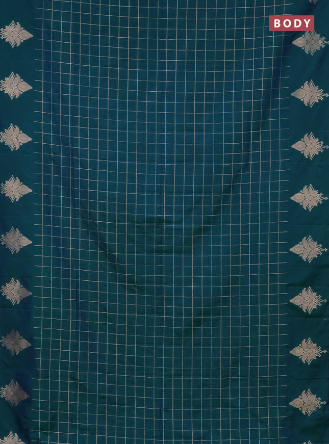 Semi soft silk saree dual shade of greenish blue with allover zari woven checked pattern and zari woven butta border